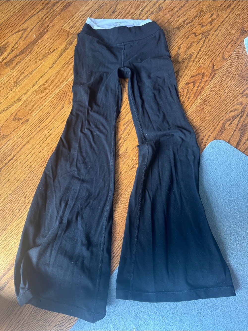 Athleta Black and White Transcend Crossover Ultra Flare Leggings